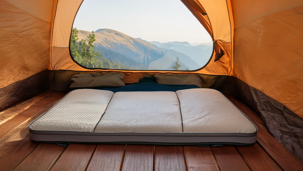 Folding mattress in a tent